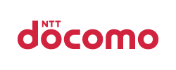 The logo of NTT Docomo, featuring the brand name in red text on a white background.