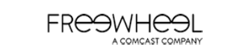 Logo of FreeWheel, a Comcast company, displayed in black text on a transparent background.
